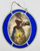 AN UNUSUAL VINTAGE STAINED GLASS PANEL DEPICTING A WOMAN CARRYING A TRAY.