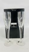 A PAIR OF JOHN ROCHA WATERFORD CRYSTAL SIGNATURE CHAMPAGNE FLUTES IN ORIGINAL PRESENTATION BOX.