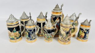 A COLLECTION OF 9 ASSORTED GERMAN STEINS.