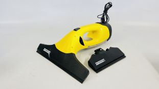 K'ARCHER WINDOW VAC WITH CHARGER AND ACCESSORIES - SOLD AS SEEN.