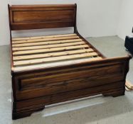 A GOOD QUALITY REPRODUCTION HARDWOOD DOUBLE SLEIGH BED.