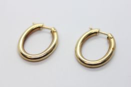A PAIR OF 9CT GOLD HOOP EARRINGS.