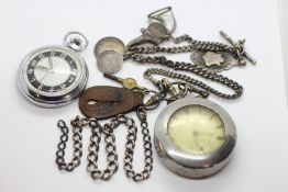 A GENTLEMAN'S INGERSOL STEEL CASED POCKET WATCH ALONG WITH A FURTHER SILVER CASED POCKET WATCH
