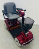 A SHOPRIDER ELECTRIC MOBILITY SCOOTER WITH BATTERY, CHARGER AND KEYS - SOLD AS SEEN.