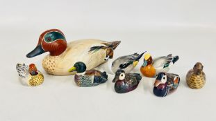 A WOODEN HAND CRAFTED & PAINTED DUCK MARKED 