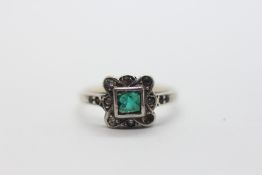 A 9CT & SILVER RING SET WITH A SQUARE GREEN EMERALD.
