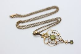 A VINTAGE 9CT GOLD EDWARDIAN STONE SET OPEN WORK PENDANT AND NECKLACE, L 45CM.