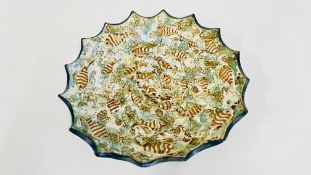 A MATT FINISH STUDIO POTTERY PLATE DEPICTING RAISED FISH BEARING SIGNATURE JANET GOUGH 147,