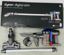 A DYSON DC35 CORDLESS HAND HELD VACUUM CLEANER WITH CHARGER AND BOX - SOLD AS SEEN.