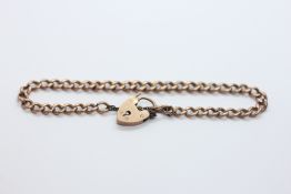 A VINTAGE 9CT ROSE GOLD BRACELET WITH HEART SHAPED PADLOCK CLASP, L 20CM.