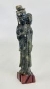 AN ANTIQUE CHINESE CARVED HARDSTONE FIGURE SYMBOLISING 