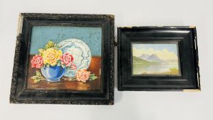 A FRAMED OIL ON BOARD STILL LIFE DEPICTING A ROSE VASE AND A BLUE AND WHITE PLATE BEARING SIGNATURE