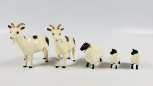 TWO BESWICK PORCELAIN GOAT ORNAMENTS + A BESWICK BLACK FACED EWE AND A PAIR OF BLACK FACED LAMBS.