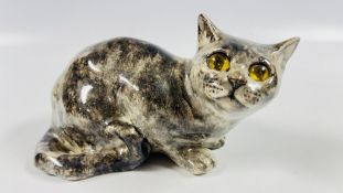 A GLAZED WINSTANLEY STUDIO POTTERY CROUCHING CAT No. 3, SIGNED.