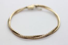 A 9CT YELLOW GOLD DOUBLE STRAND BRACELET.