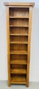 A MODERN SOLID LIGHT OAK TOWER SHELVING UNIT, W 56CM, D 24CM, H 186CM.