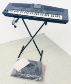 A TECHNICS KN5000 KEYBOARD WITH STAND AND CASE - SOLD AS SEEN.