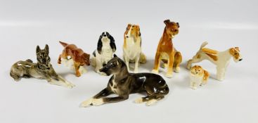 A GROUP OF 8 ASSORTED USSR CABINET DOG ORNAMENTS TO INCLUDE VARIOUS BREEDS, COLLIE,