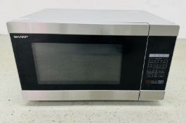 A SHARP MICROWAVE OVEN - SOLD AS SEEN.