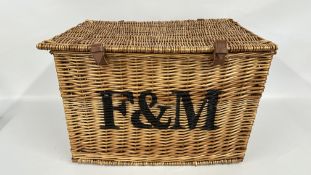 A LARGE FORTNUM & MASON WICKER PICNIC BASKET.