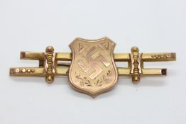A 9CT GOLD WWII GERMAN BROOCH.