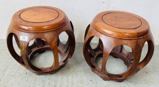 A PAIR OF REPRODUCTION CHERRYWOOD DRUM STOOLS FEATURING OPEN ARCHED BARREL DESIGN, HEIGHT 34CM.