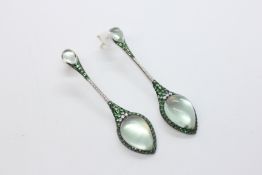 A PAIR OF PURE JEWELS 18CT WHITE GOLD COCKTAIL EARRINGS SET WITH GREEN GARNETS,