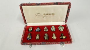 A CASED SET OF 10 MINIATURE CLOISONNE BOTTLE / VASE PENDANTS THE CASE MARKED 