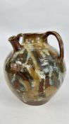 A STUDIO POTTERY TWIN HANDLED VASE WITH SPOUT AND BROWN BLUE DRIP GLAZE,