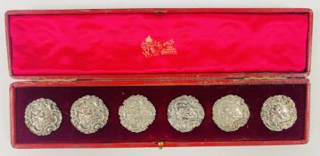 A SET OF 6 ANTIQUE SILVER BUTTONS, RELIEF DECORATED WITH CHERUBS,