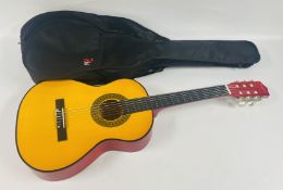A MARTIN SMITH GUITAR MODEL W-560-N IN PROTECTIVE BAG.