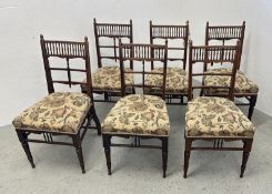 A SET OF 6 ANTIQUE EDWARDIAN OAK FRAMED DINING CHAIRS WITH TURNED SPINDLE GALLERY BACKS AND