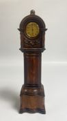 A GOOD QUALITY VINTAGE MINIATURE CARVED MAHOGANY LONG CASE CLOCK WITH 8 DAY SWISS MOVEMENT.