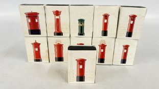A COLLECTION OF 11 ROYAL MAIL HANDMADE PEWTER PILLAR BOX PIN BADGES IN ORIGINAL PRESENTATION BOXES.