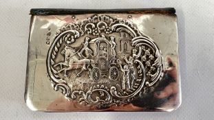 A SILVER REPOUSSE COVERED WALLET 1903 BY WILLIAM COMYNS.
