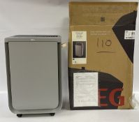 AN AEG PURE MULTI 7000 AIR PURIFIER WITH FAN WITH ORIGINAL BOX, MODEL: APU72571UG - SOLD AS SEEN.