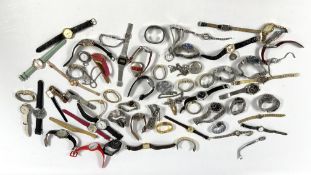 A TRAY CONTAINING AN EXTENSIVE GROUP OF ASSORTED WRIST WATCHES TO INCLUDE DESIGNER BRANDED EXAMPLES.