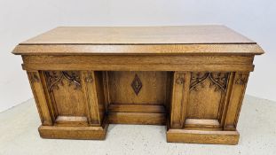 AN ANTIQUE HEAVY OAK ALTAR WITH ECCLESIASTICAL CARVED PANEL DETAIL, WIDTH 176CM, DEPTH 79CM,