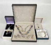 A BOX OF MIXED SILVER AND WHITE METAL JEWELLERY, CHARMS, PENDANT NECKLACES AND EARRINGS.