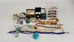 A BOX CONTAINING MIXED COSTUME JEWELLERY, BEADED NECKLACES, BANGLES, FASHION, CUFF LINKS ETC.