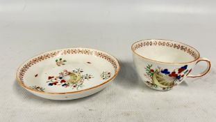 AN ANTIQUE PORCELAIN SHELL PATTERN CUP AND SAUCER ATTRIBUTED TO JOSEPH MACHIN.