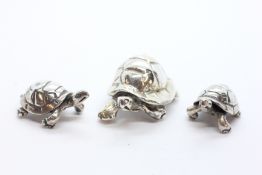 THREE SILVER TURTLES, VARIOUS SIZES.