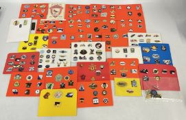 AN EXTENSIVE COLLECTION OF ASSORTED MODERN AND VINTAGE ENAMEL BADGES DISPLAYED ON CARD VARIOUS