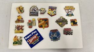 A CARD CONTAINING A GROUP OF MODERN AND VINTAGE GAMING RELATED BADGES TO INCLUDE 