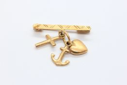 AN 18CT ANTIQUE GOLD BAR BROOCH WITH HEART, ANCHOR AND CROSS PENDANTS, REPRESENTING FAITH,