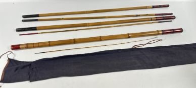 A VINTAGE JAPANESE 5 PIECE BAMBOO FISH ROD AND CANVAS BAG.