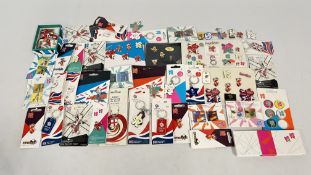 A BOX OF TEAM GB OLYMPIC AND PARALYMPIC COLLECTORS BADGES TO INCLUDE STAMP EXAMPLES,
