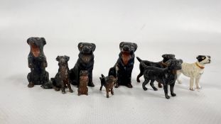 A GROUP OF 9 VINTAGE COLD PAINTED DOG FIGURES.