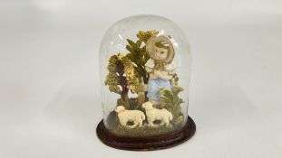 A VICTORIAN WAX DIORAMA FEATURING A SHEPHERD GIRL AND LAMBS UNDER A GLASS DOME.