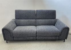 AN ITALIAN DESIGNER POLTRONESOFA TWO SEATER ELECTRIC RECLINING SOFA WITH USB CHARGING.